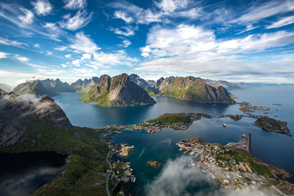 Reine Lofoten is an archipelago in the county of Nordland, Norway. Is known for a distinctive scenery with dramatic mountains and peaks, open sea and sheltered bays, beaches and untouched lands.