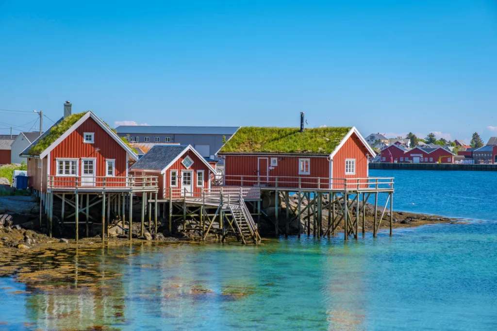 Red Cabins on Stilts in a Norwegian Fjord, Reine, Lofoten, Norway